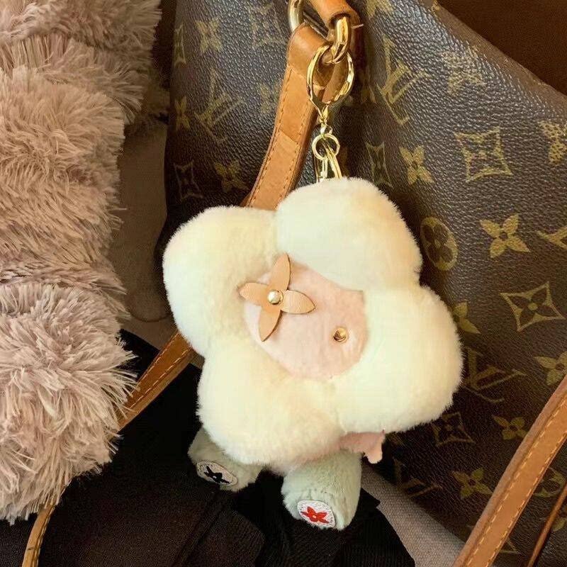 LV&GEDETE 毛绒太阳花公仔小牛角包挂件汽车钥匙扣挂饰老花钥匙链图片