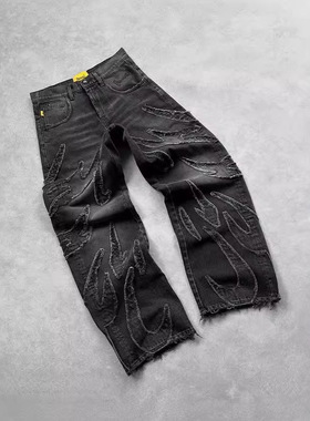 欧美简约复古黑色拼凑洞牛仔裤