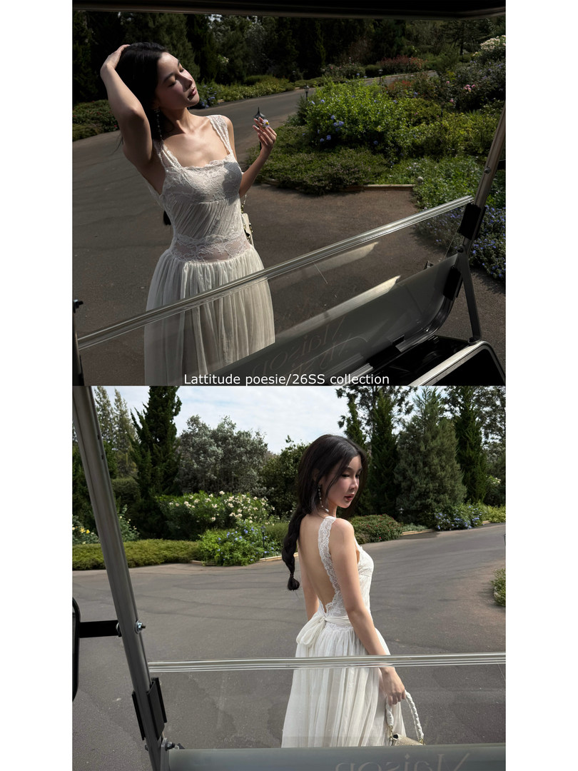 Model wearing a white lace maxi dress outdoors