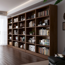 全实木书柜一面墙书架落地胡桃木色满墙展示柜靠墙一体家用收纳柜