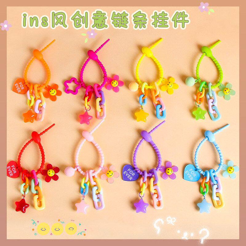 网红笑脸花朵钥匙链创意百搭挂饰