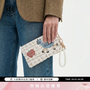 珍珠链粗花呢白色手提包T78A40E5016 TCH烫钻小马手拿包女2026新款