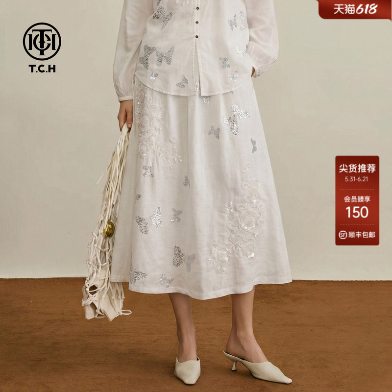 TCH白色亚麻半身裙女2026夏季新款烫钻蝴蝶松紧腰A子中长款大摆裙