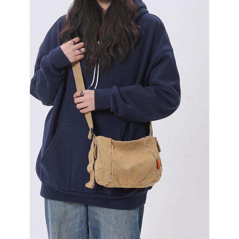 帆布新款小挎包男士轻便随身外出单肩小包男款潮流运动斜挎包男女