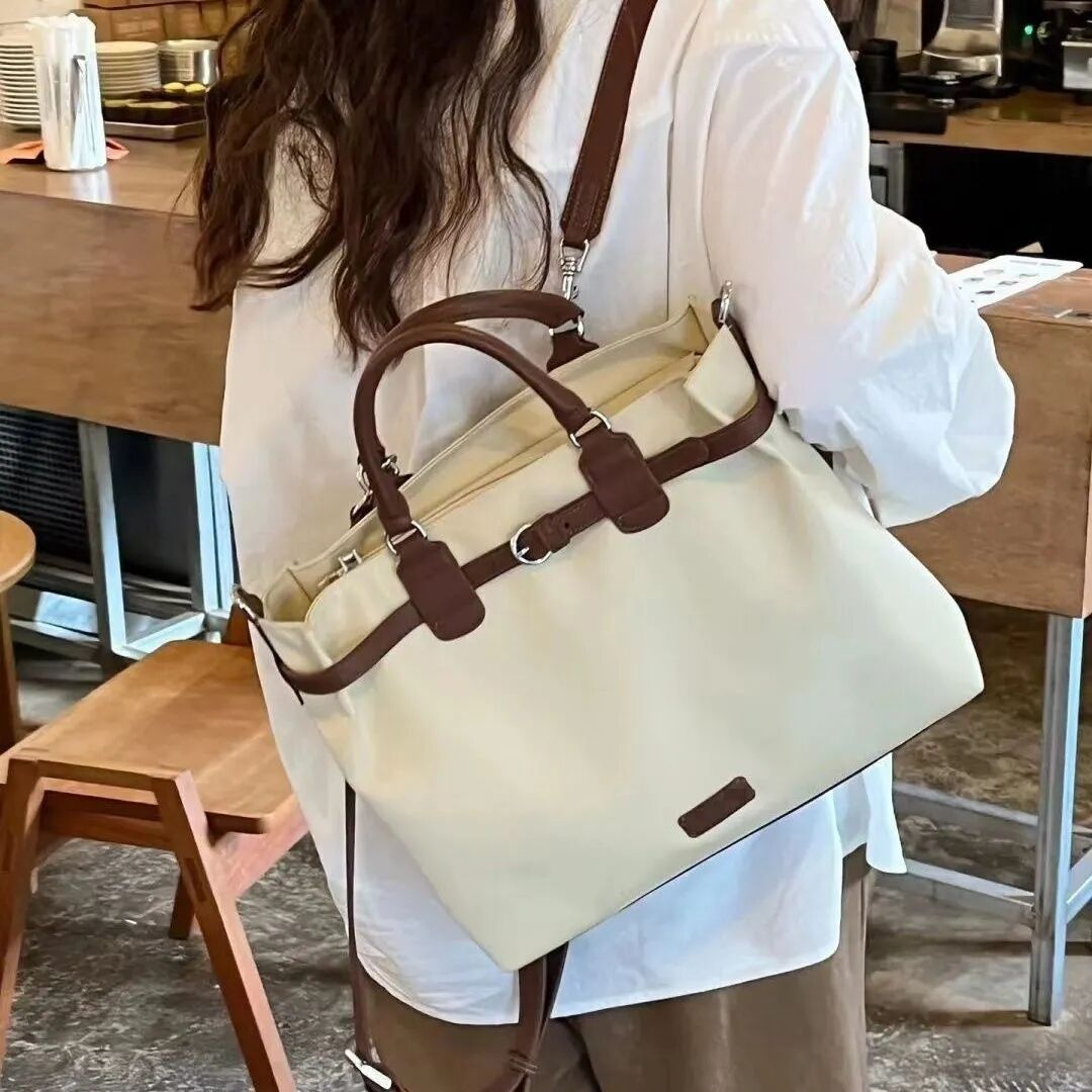 双肩包女士小众设计感纯色大容量背包通勤手提公文包斜挎包
