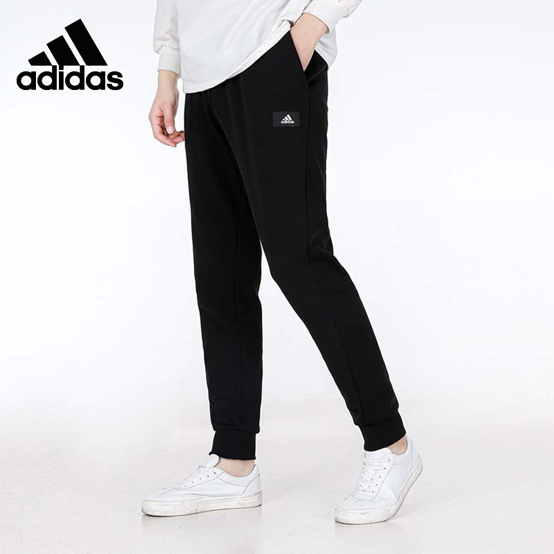 阿迪达斯男裤子春秋新款宽松休闲束脚裤卫裤运动长裤HE2225