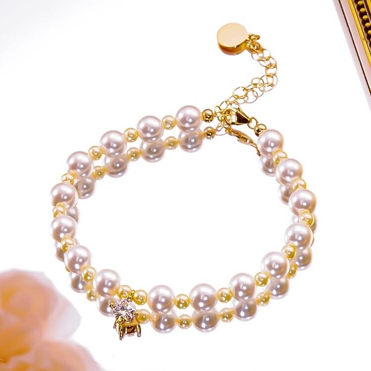 AU750玫瑰金镶嵌D色莫桑石天然淡水珍珠单钻手链可调节女纯银温柔