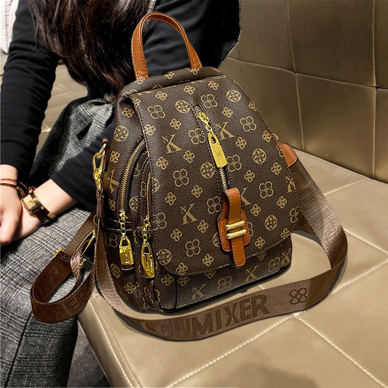 今年流行女士包包2026新款潮高级感时尚多功能真皮背包旅游双肩包