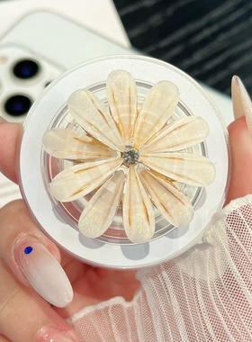 带钻花朵磁吸气囊手机支架magsafe吸附式桌面支撑气垫背贴新款强磁力可伸缩手持指环扣适用苹果16promax15pro