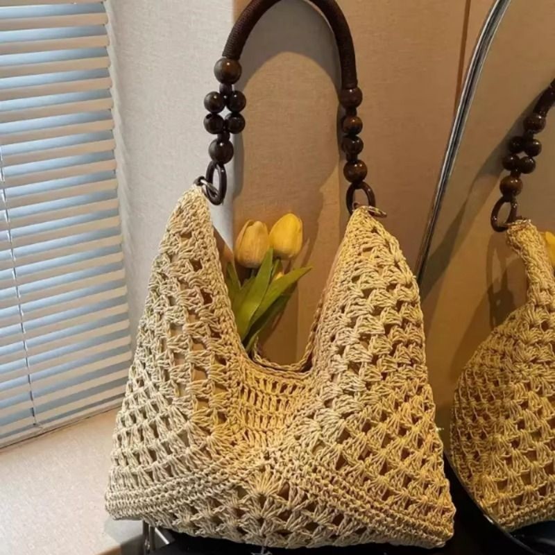 夏天草编包包女2025新款海边度假沙滩镂空单肩托特包编织菜篮子包