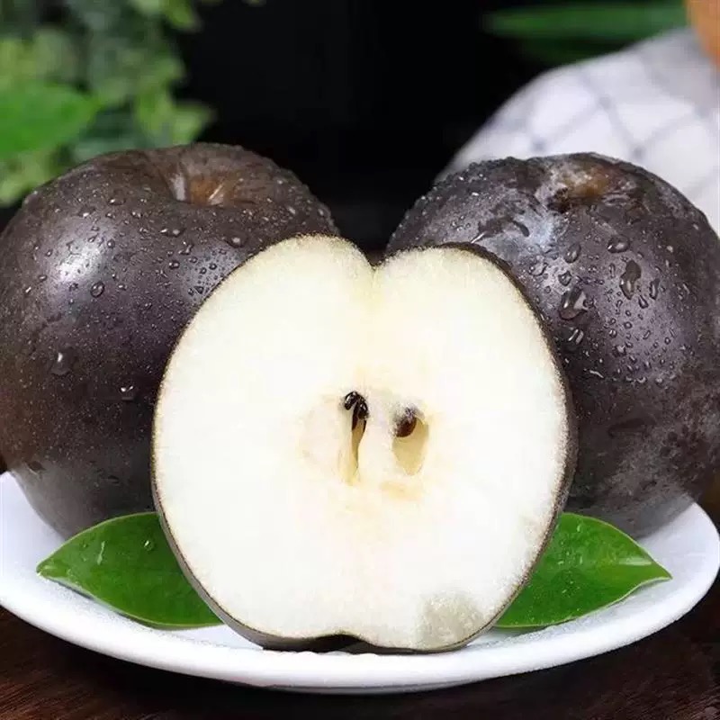 乌黑梨稀有新鲜水果皮薄肉厚汁水纯甜无酸黑皮梨子整箱包邮