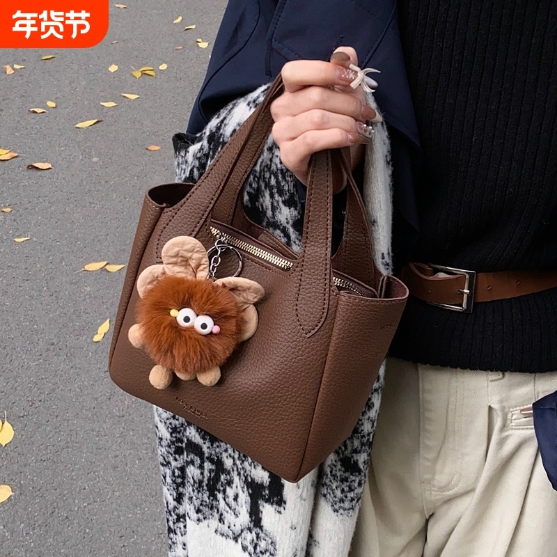 高级质感女士包包2026新款超火休闲复古斜挎包百搭通勤手提水桶包,箱包皮具/热销女包/男包,水桶包,淘宝优惠券,粉丝福利购,淘宝优惠卷