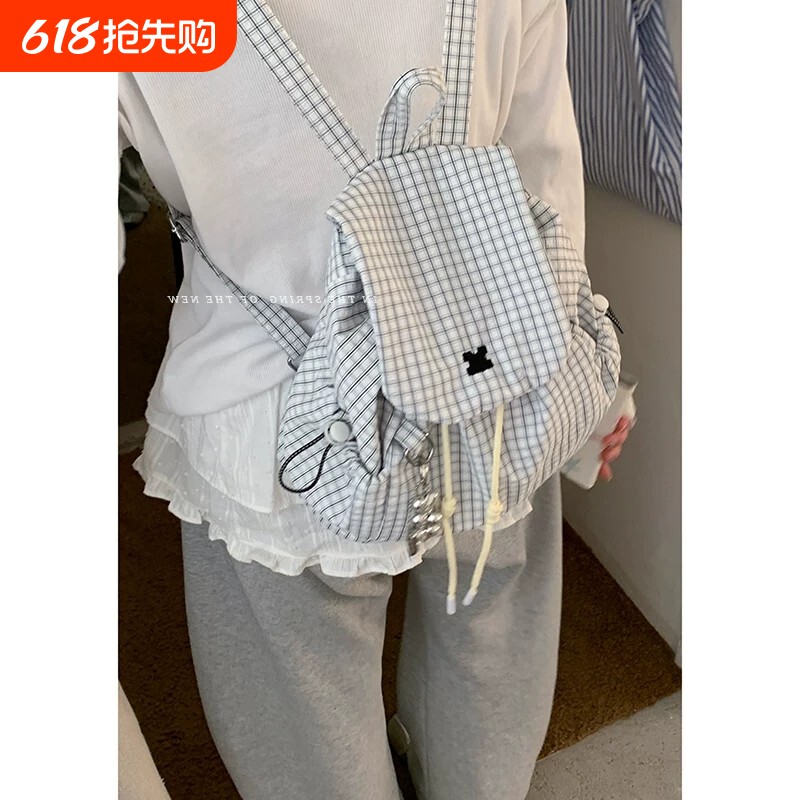 格子帆布包包女2026新款潮韩国学院双肩包出游书包背包单肩水桶包
