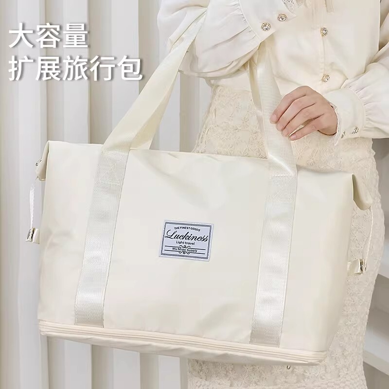 旅行包女大容量手提轻便防水行李袋短途外出旅游登机待产包收纳袋