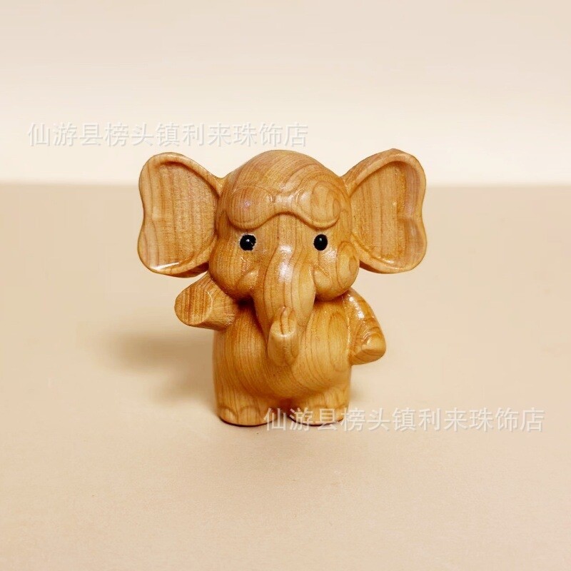 崖柏木雕耍酷小飞象桌面装饰摆件可爱小象工艺品厂家批发儿童玩具