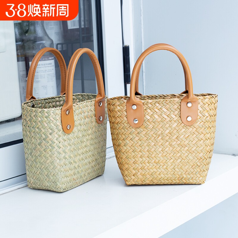 草编包手工编织小众设计手拎女包时尚气质手提小包海边度假沙滩包