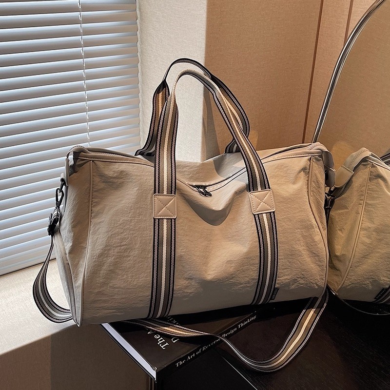 大容量旅行包尼龙防水行李袋手提登机袋长短途单肩健身游泳出差包