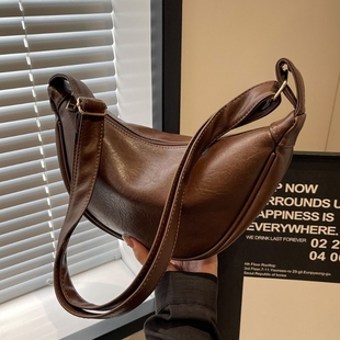 伊布古奇包包女斜挎包2025新款大容量小众设计高级复古单肩饺子包