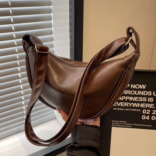 伊布古奇包包女斜挎包2025新款大容量小众设计高级复古单肩饺子包