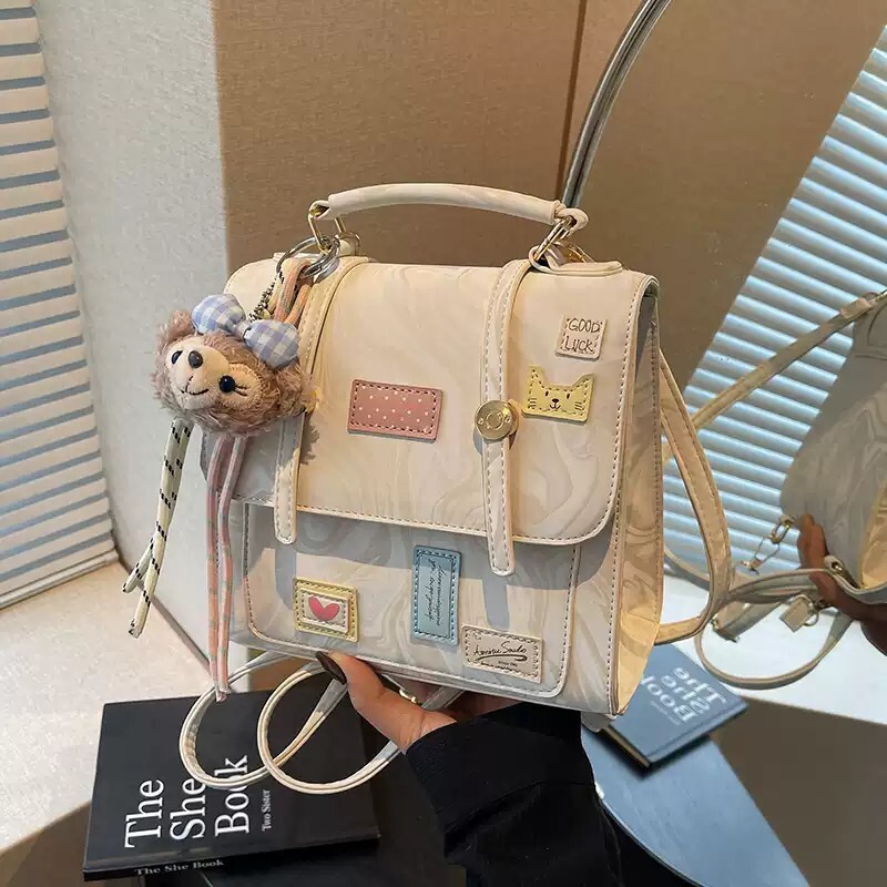 艾米兔包包女式2025新款韩版百搭学生党双肩包时尚可爱手提斜挎包
