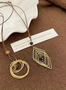 拉德金色虎眼石长款项链女款轻奢高级毛衣复古装饰配饰吊坠