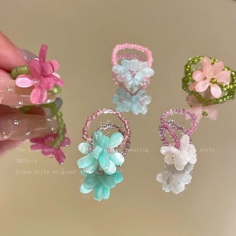 紫罗兰花朵弹力串珠戒指图片