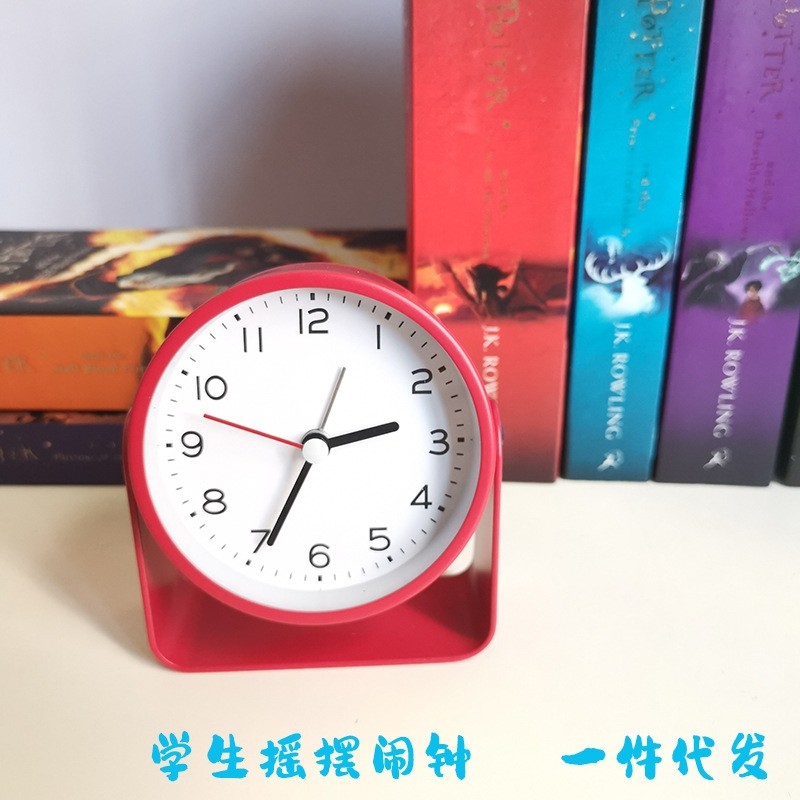 创意金属闹钟  可以拿着玩的摇摆小转钟  静音带闹钟3寸床头座钟