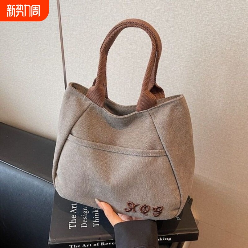 小众帆布包女出门上班小拎包通勤托特包新款日常百搭饭盒手提包