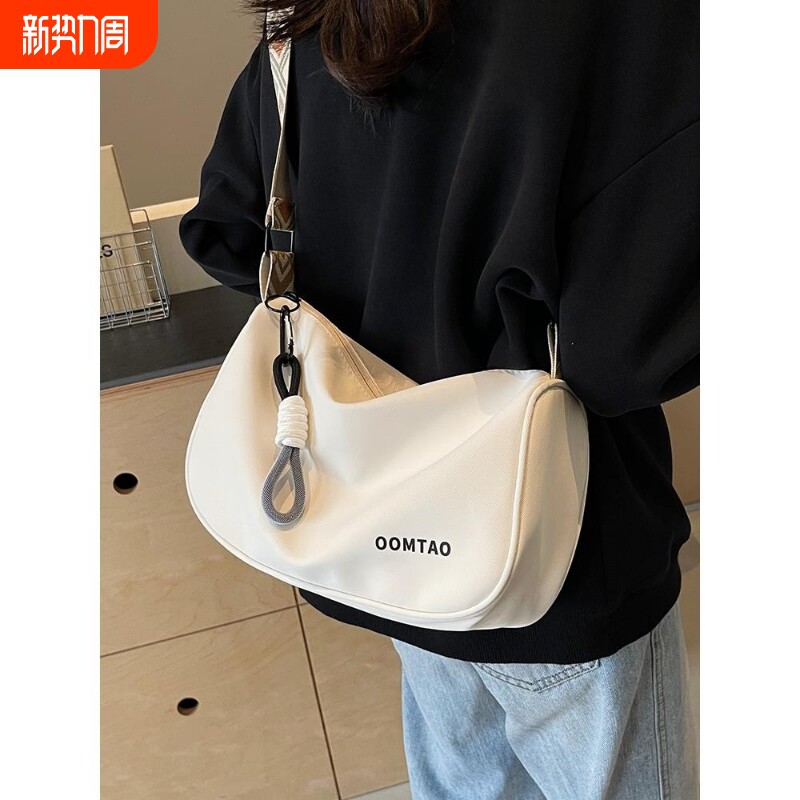 伊布古奇包包女大容量2025新款帆布百搭宽带单肩包斜挎轻便大气