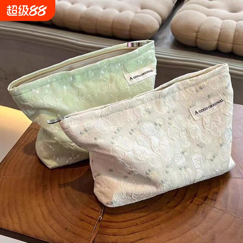 女生化妆包高级感ins便携高颜值化妆品收纳袋大容量手拿包新手工