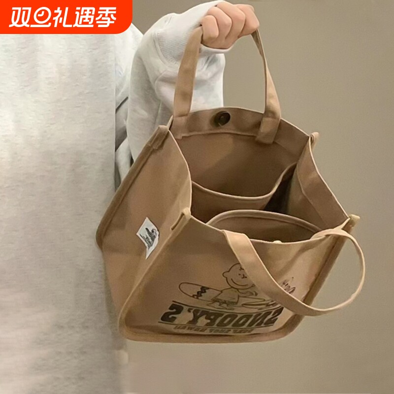 帆布袋便当包上班族饭盒袋子手提包的手拎包斜挎定制水桶包好看