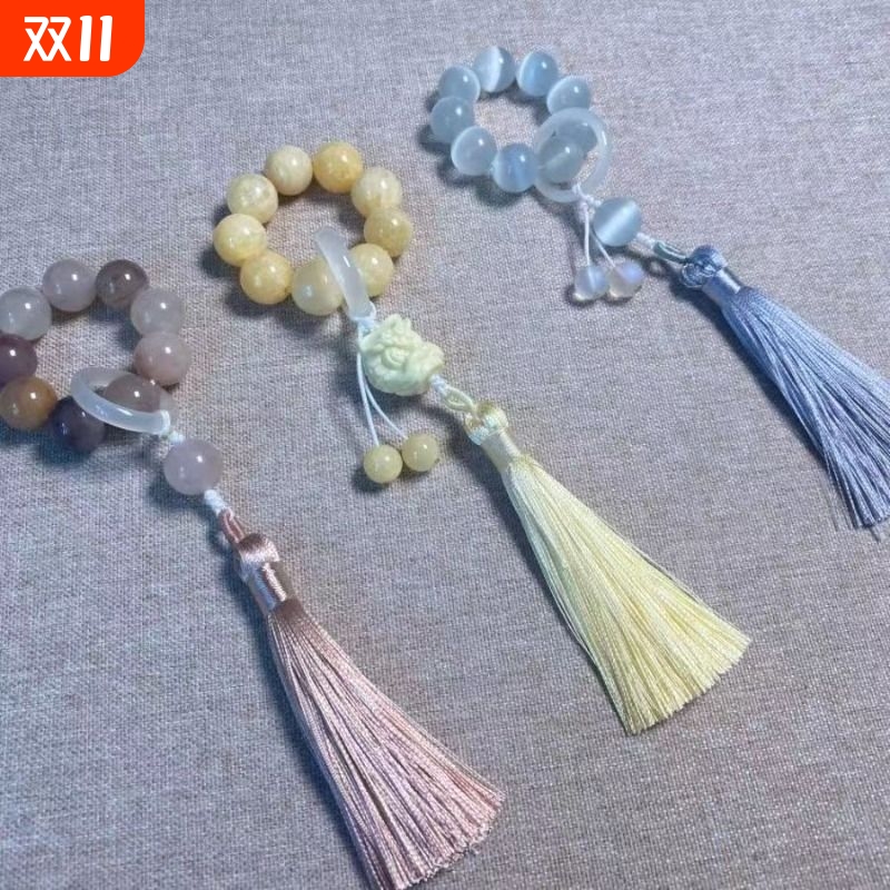 新品青白玉手捻女流苏象牙果醒狮绕指柔小串流苏手串一件代发