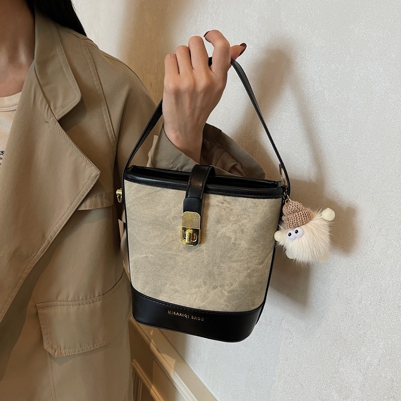 伊布古奇复古包包女款2025手提水桶包斜挎包时尚百搭简约通勤包