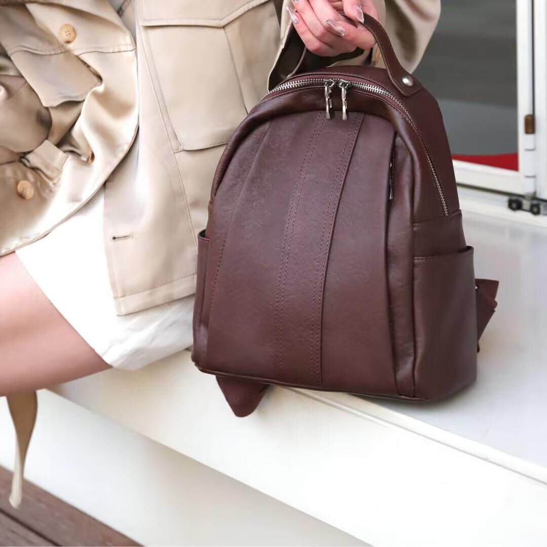 新品真皮背包韩版百搭手感好皮质软头层牛皮男女通用实用双肩背包