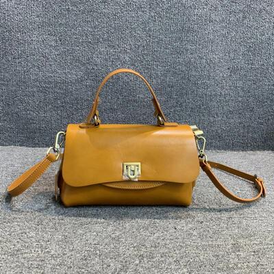 梦嘉丽头层牛皮手提单肩锁扣包