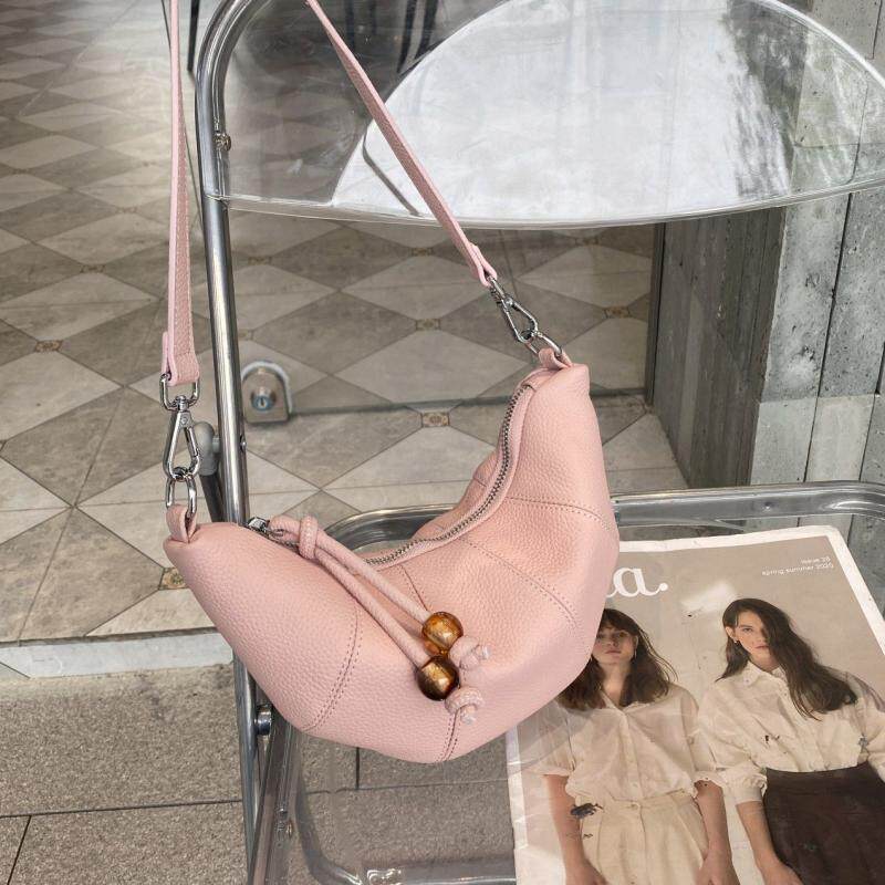 梦嘉丽头层牛皮牛角包女饺子包
