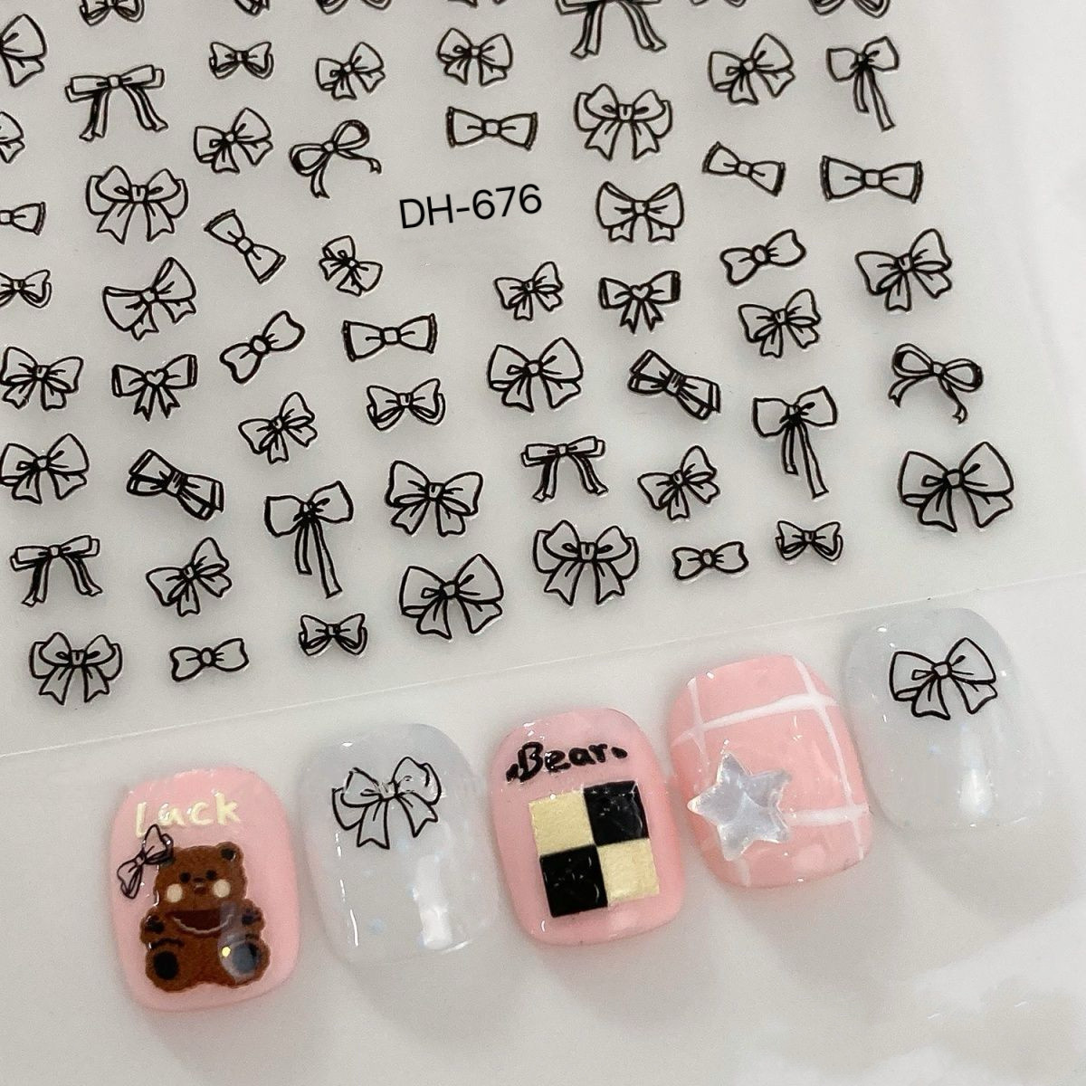 ins镂空蝴蝶结网红美甲贴纸黑白蝴蝶结蝴蝶结指甲贴纸迷你短甲,彩妆/香水/美妆工具,指甲装饰,淘宝优惠券,粉丝福利购,淘宝优惠卷