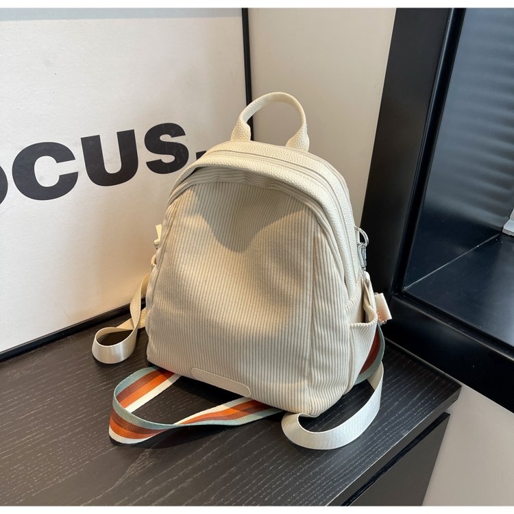 2025春夏新款清新文艺双肩背包ins多用条绒斜挎包洋气拉链小包女