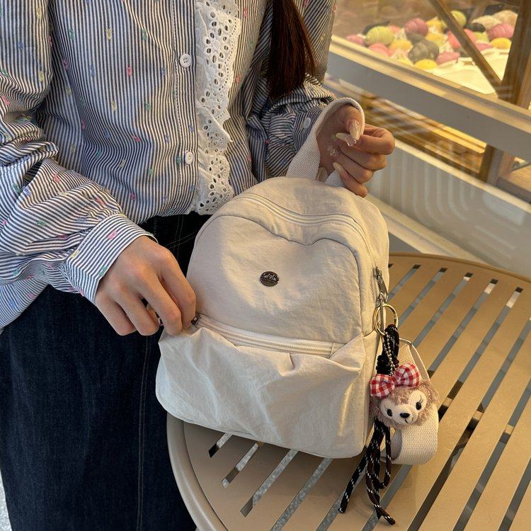 轻便休闲纯色双肩包2025新款气质通勤小巧背包出游旅行洋气小包女