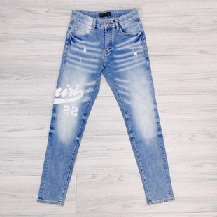 欧美潮牌AMR浅蓝色牛仔裤男新款修身弹力碎片印花骚气雅痞长裤子