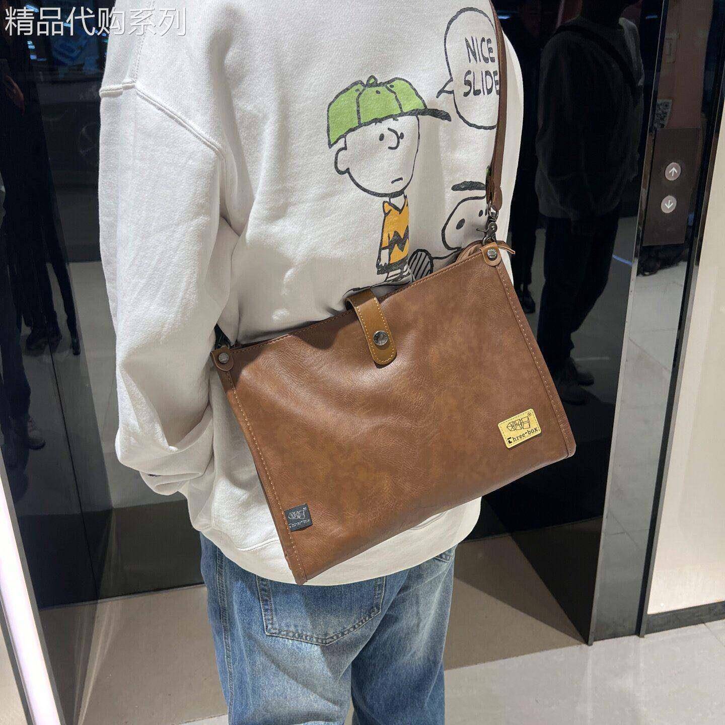 香港代购简约真皮男士单肩包休闲斜揹包日韩牛皮平板商务A4邮差包