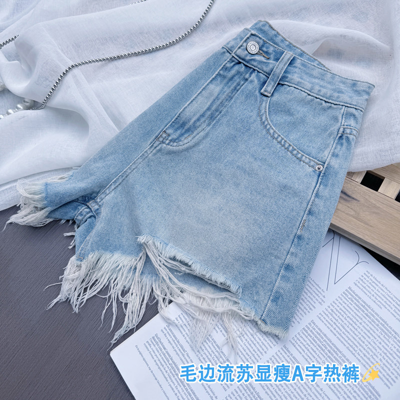美式高街~浅蓝色辣妹破洞高腰牛仔短裤女a版烂毛边显瘦超模热裤子