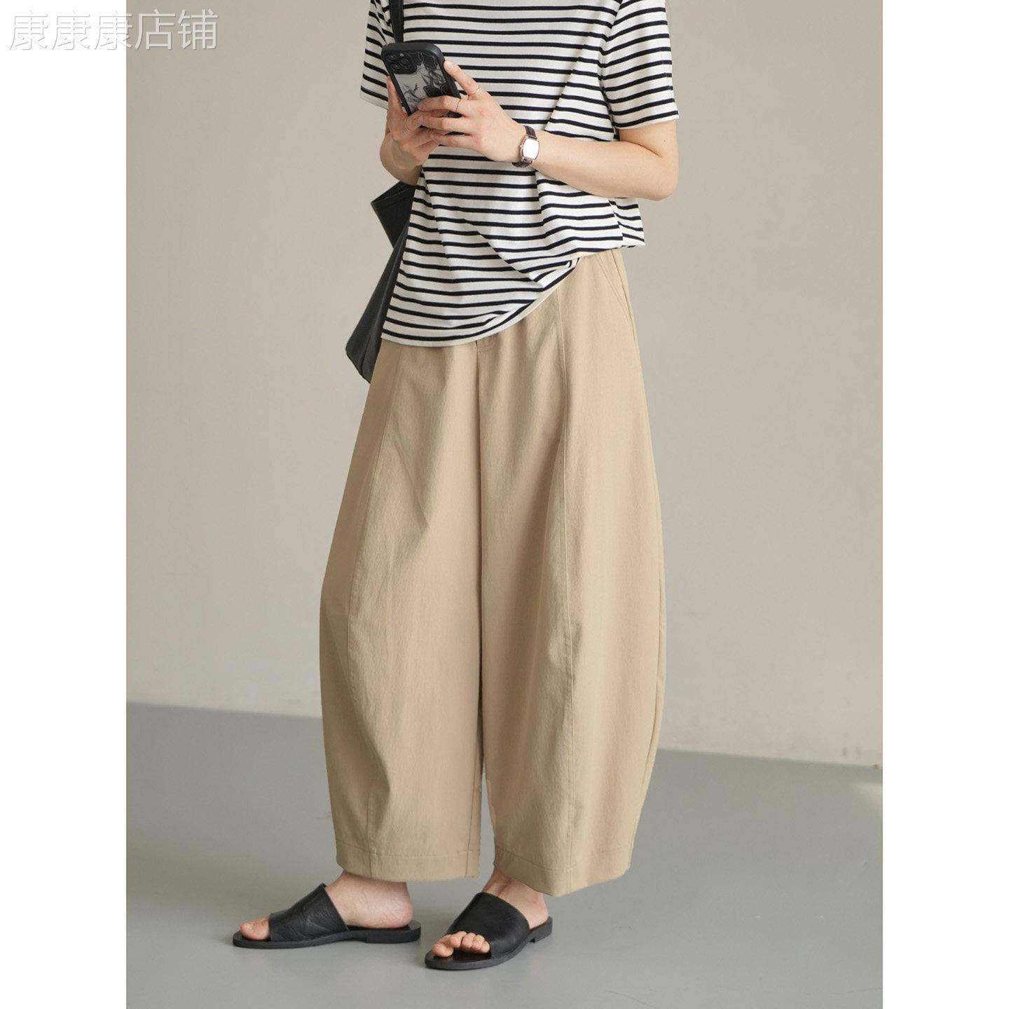 复古卡其色休闲裤女夏季2026年新款百搭松紧腰裤子显瘦大码九分裤