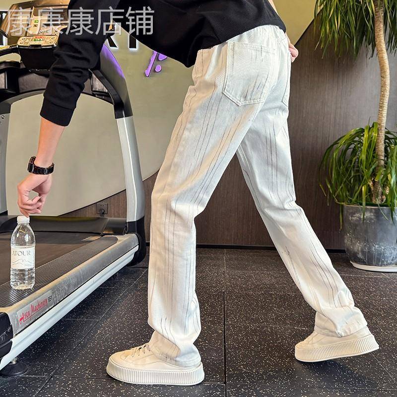 美式高街牛仔裤男款喷墨微喇显瘦裤子2026新款春夏季痞帅休闲男裤