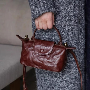 植鞣头层软皮手机包女高级感复古手提单肩斜挎小包包迷你饺子包