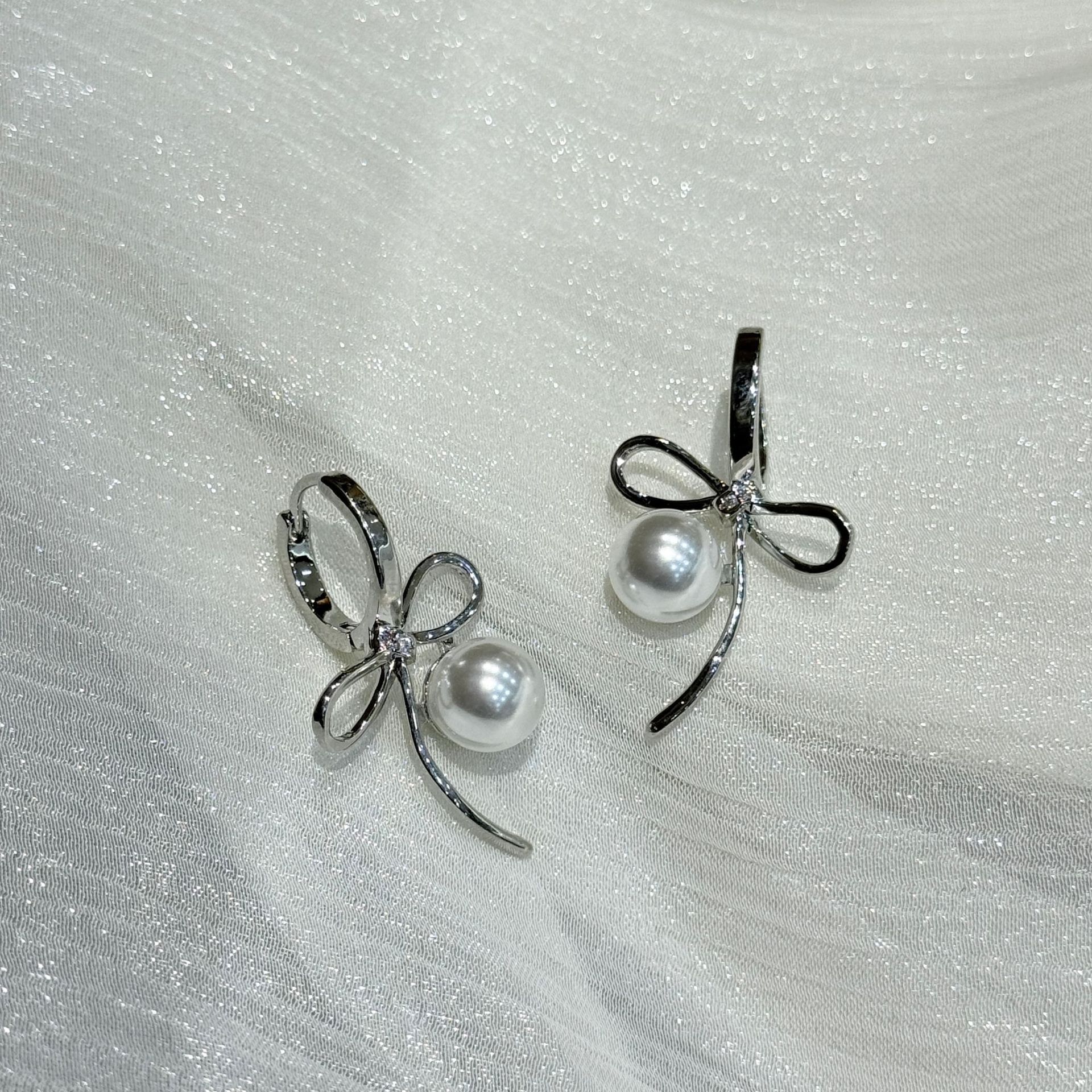 s925银针施家珍珠耳环小众设计蝴蝶结耳扣女简约高级感秋冬耳饰