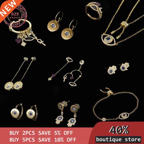 S925 Sterling Silver devil	s eye asymmetric lucky palm Ea