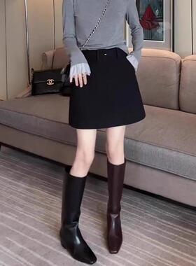 2025春秋新款黑色毛呢短裙女高腰性感辣妹气质别致爆款a字半身裙