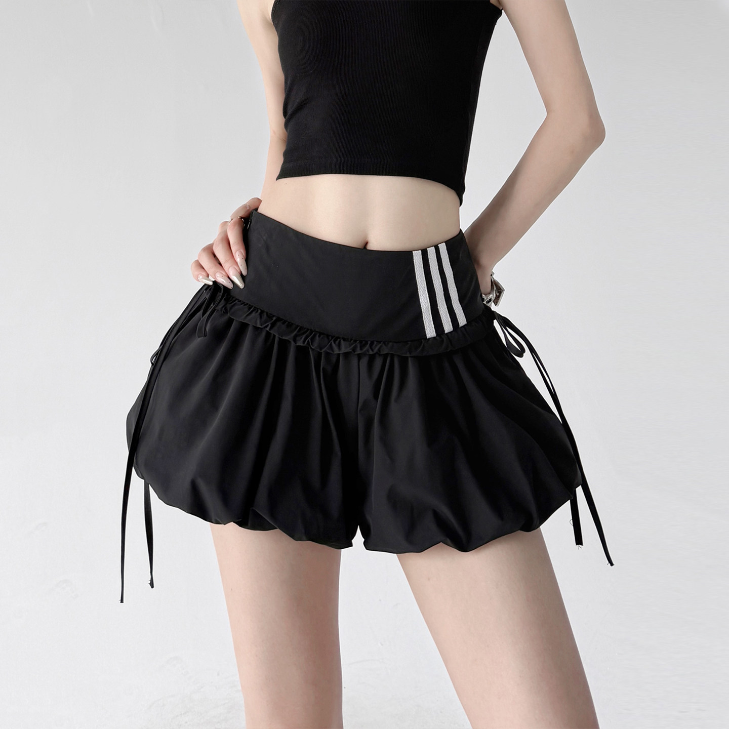 黑色法式高腰花苞半身裙女2026夏季新款绑带A字蓬蓬超短裙显瘦