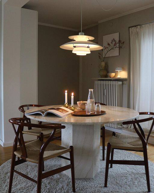 cca赵厂长法式天然洞石餐桌圆形大理石饭桌子北欧轻奢风餐厅桌